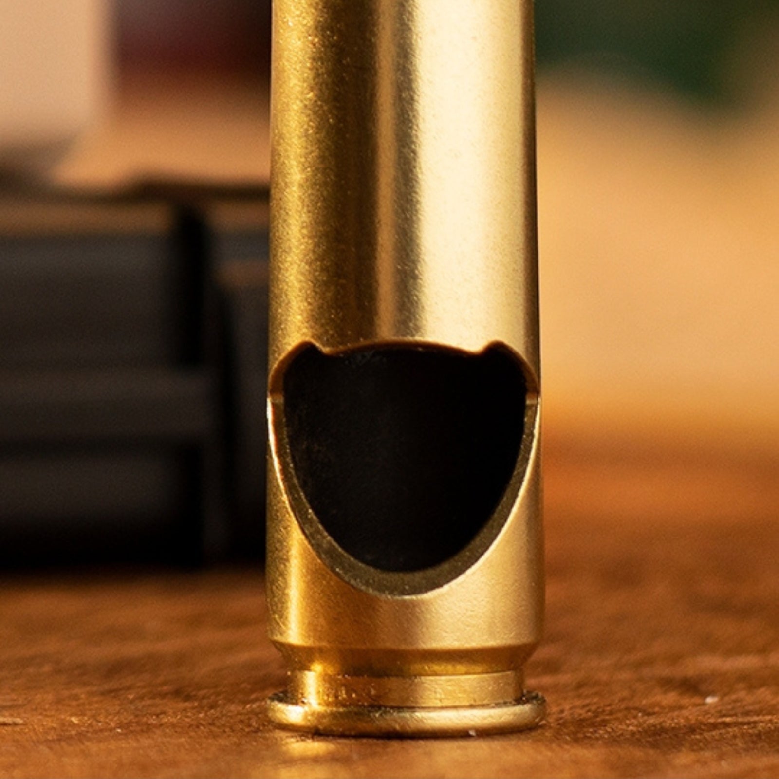 Bottle opener crafted from an authentic 50 cal casing, showcasing a rugged, military-inspired design for opening bottles with a unique, durable touch.