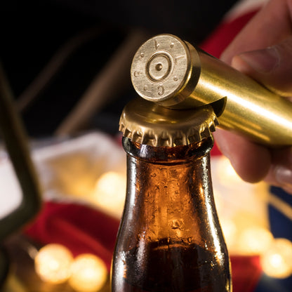 Bottle opener crafted from an authentic 50 cal casing, showcasing a rugged, military-inspired design for opening bottles with a unique, durable touch.