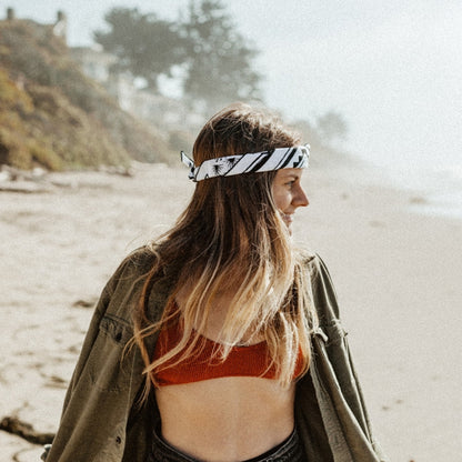 Black and white 100% organic cotton bandana with a western vintage design.