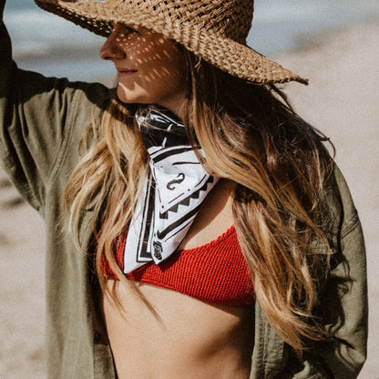 Black and white 100% organic cotton bandana with a western vintage design.