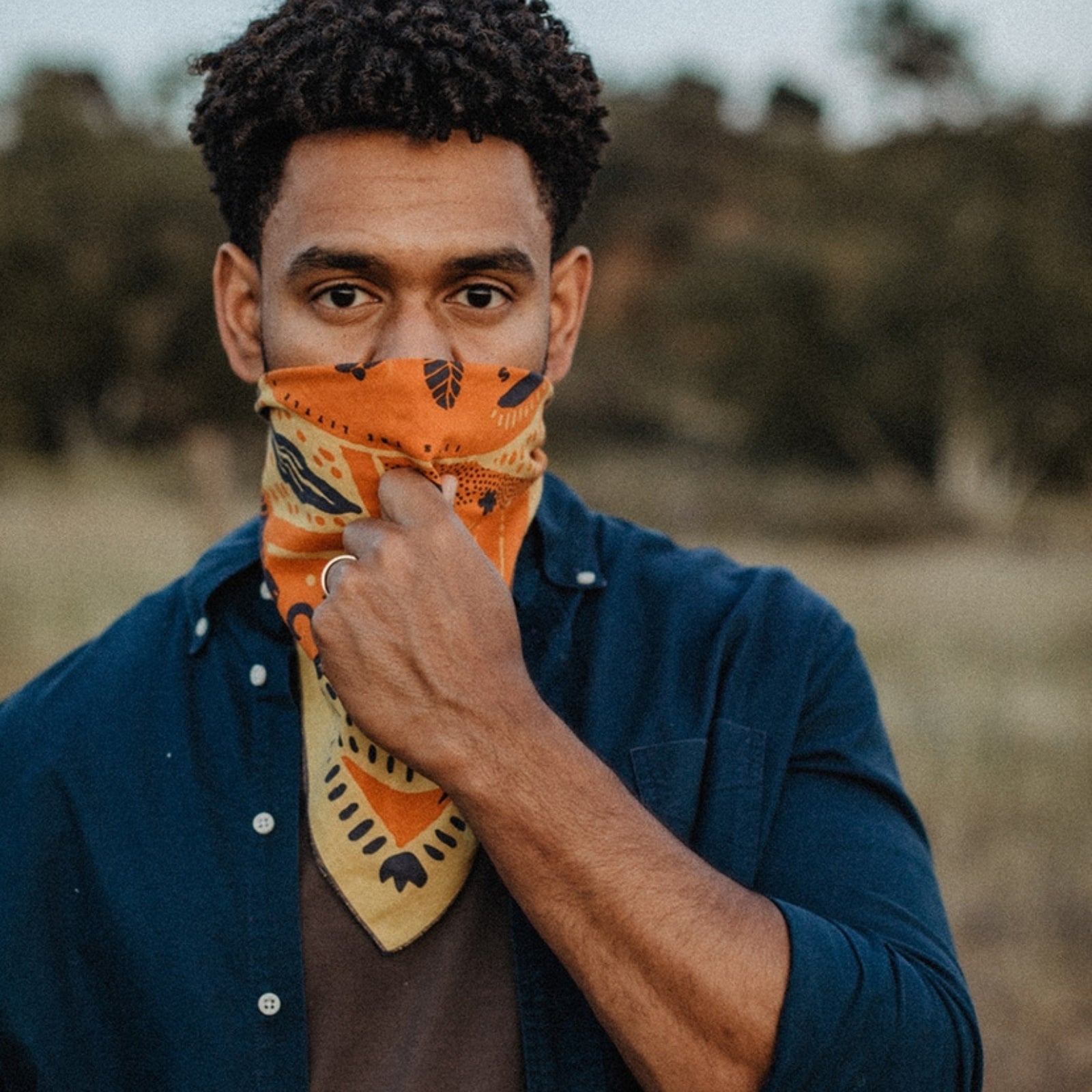 100% cotton bandana featuring Southwestern-inspired design, with vibrant patterns and cultural motifs for a bold, stylish accessory.