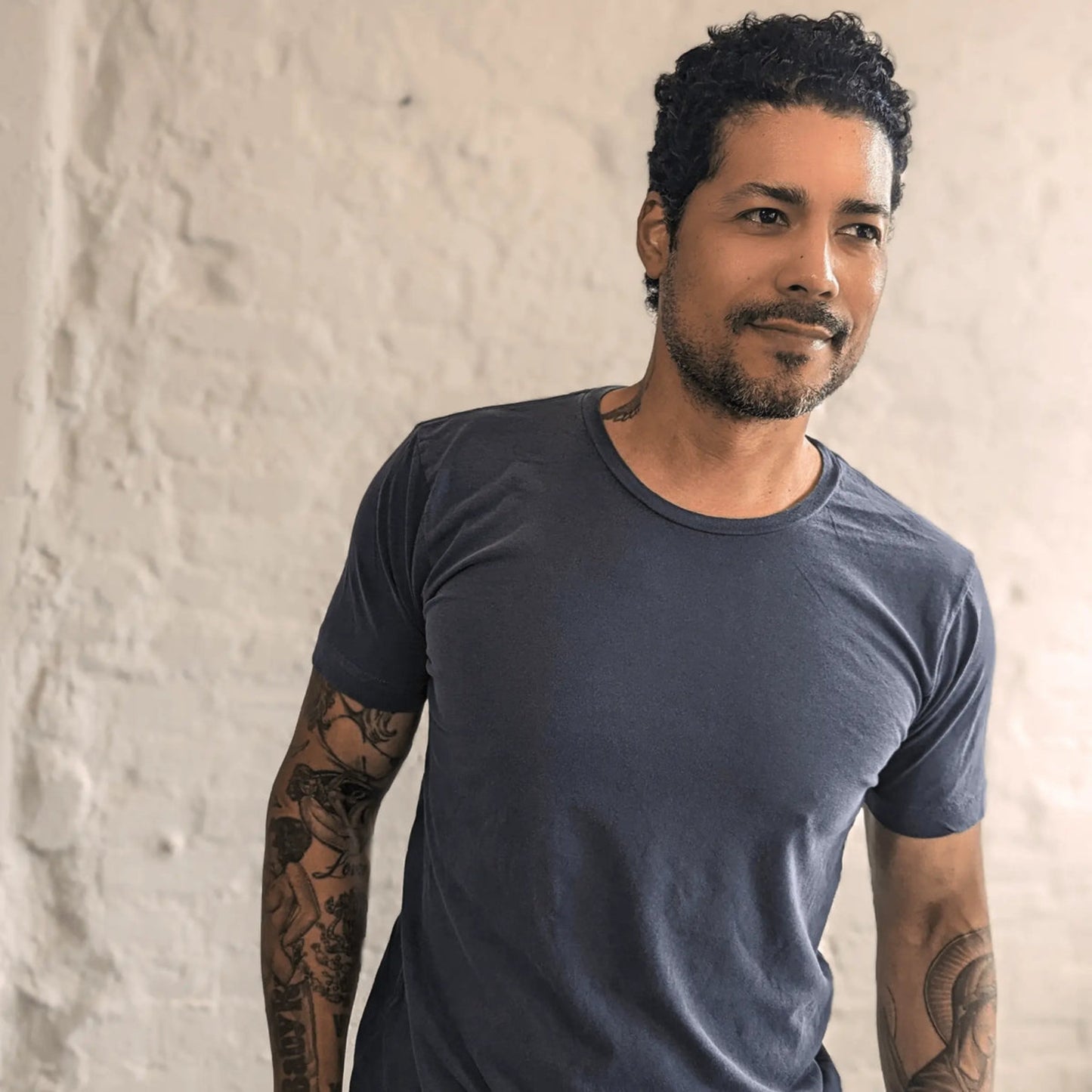 Blue ultra-soft jersey tee made in the USA, featuring a comfortable fit and high-quality fabric, perfect for everyday wear with a casual, relaxed style.