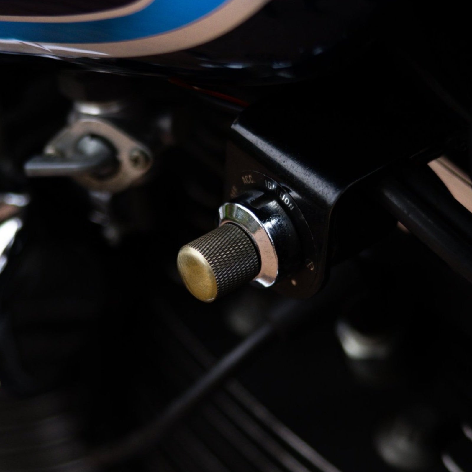 Alternative brass low profile key for motorcycles, designed for a sleek and durable ignition solution.