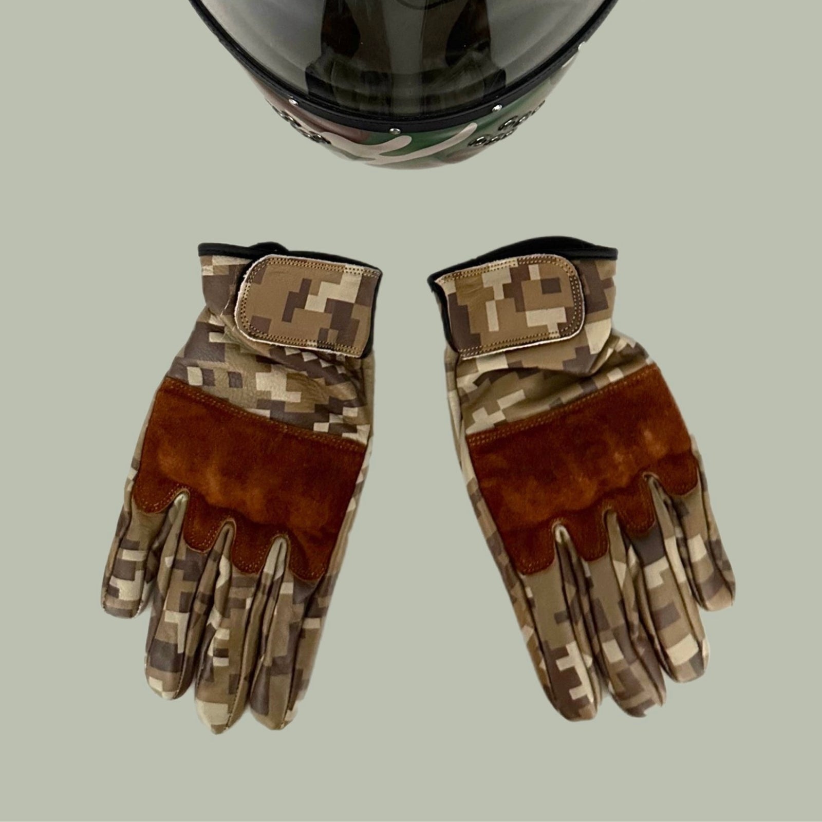 Camouflage motorcycle gloves for street riding and protective gear.

