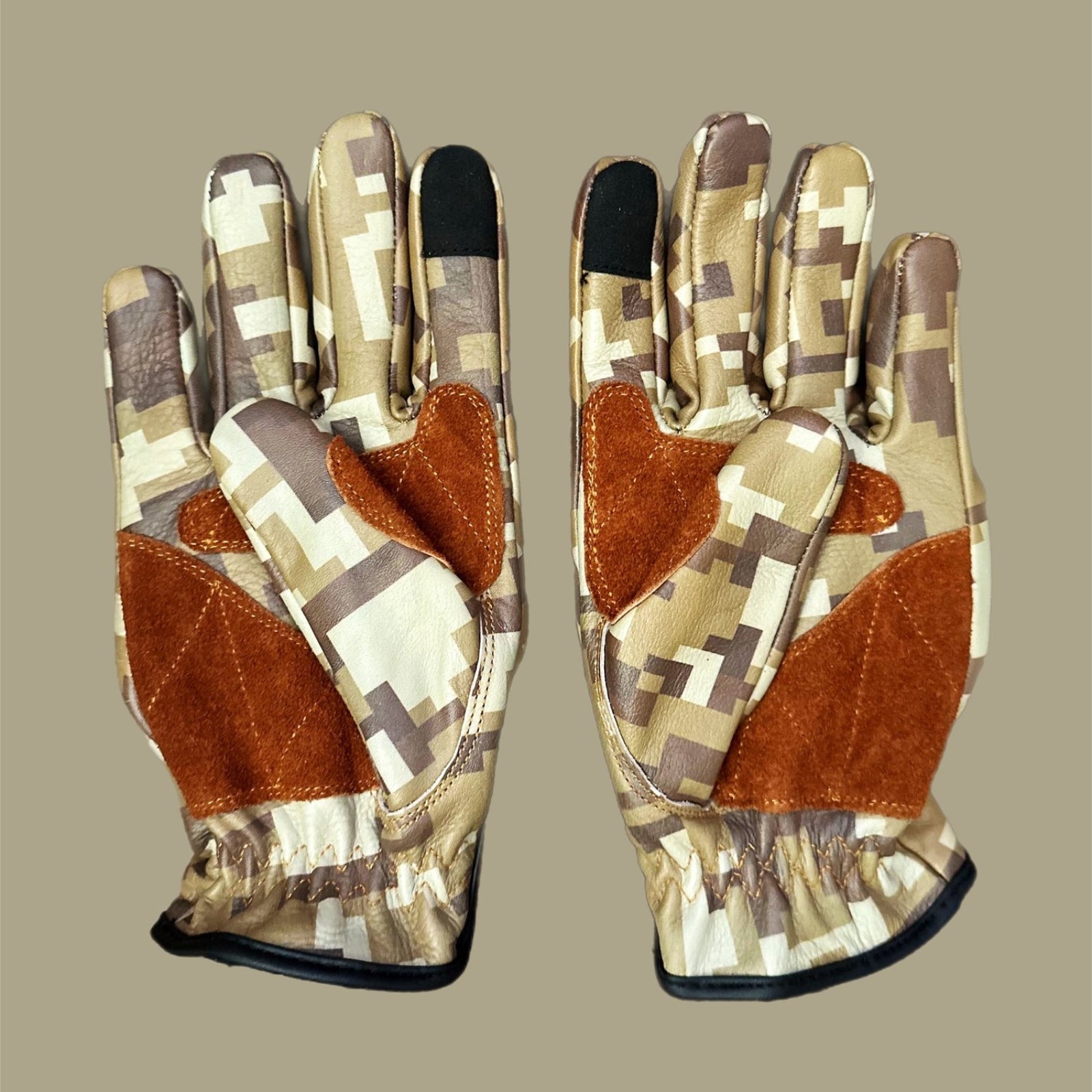 Camouflage motorcycle gloves for street riding and protective gear.
