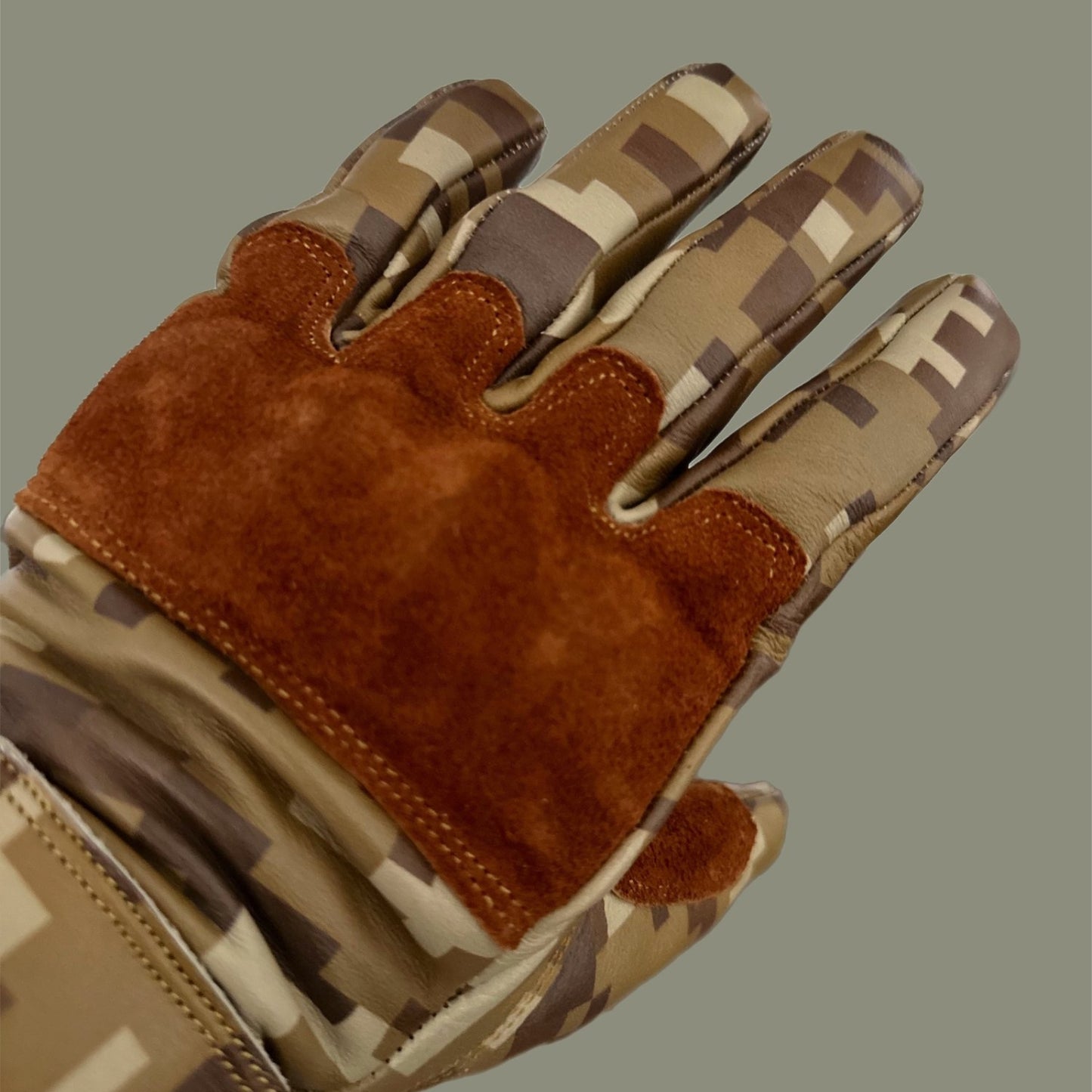 Camouflage motorcycle gloves for street riding and protective gear.
