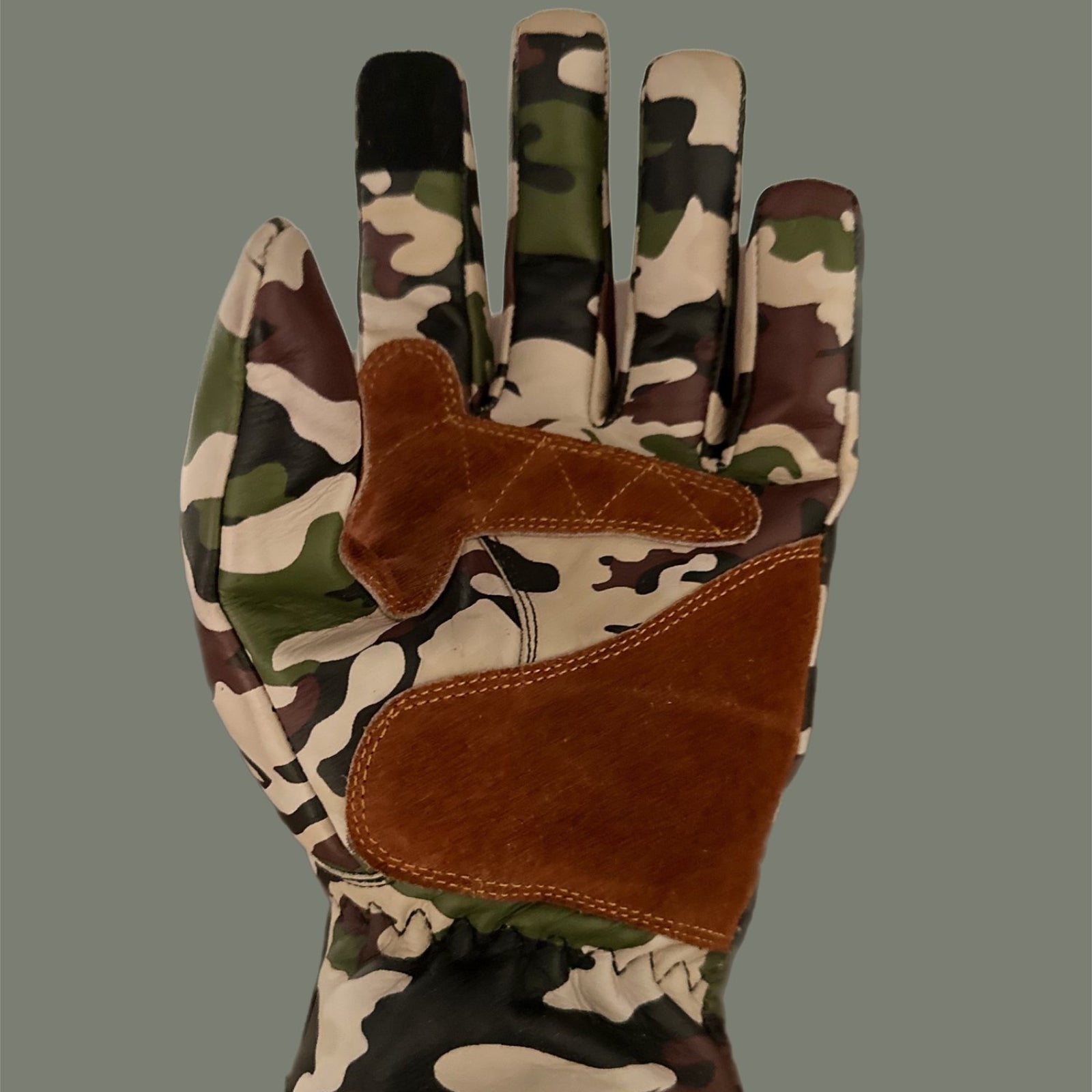 Jungle camouflage motorcycle gloves for street riding and protective gear.