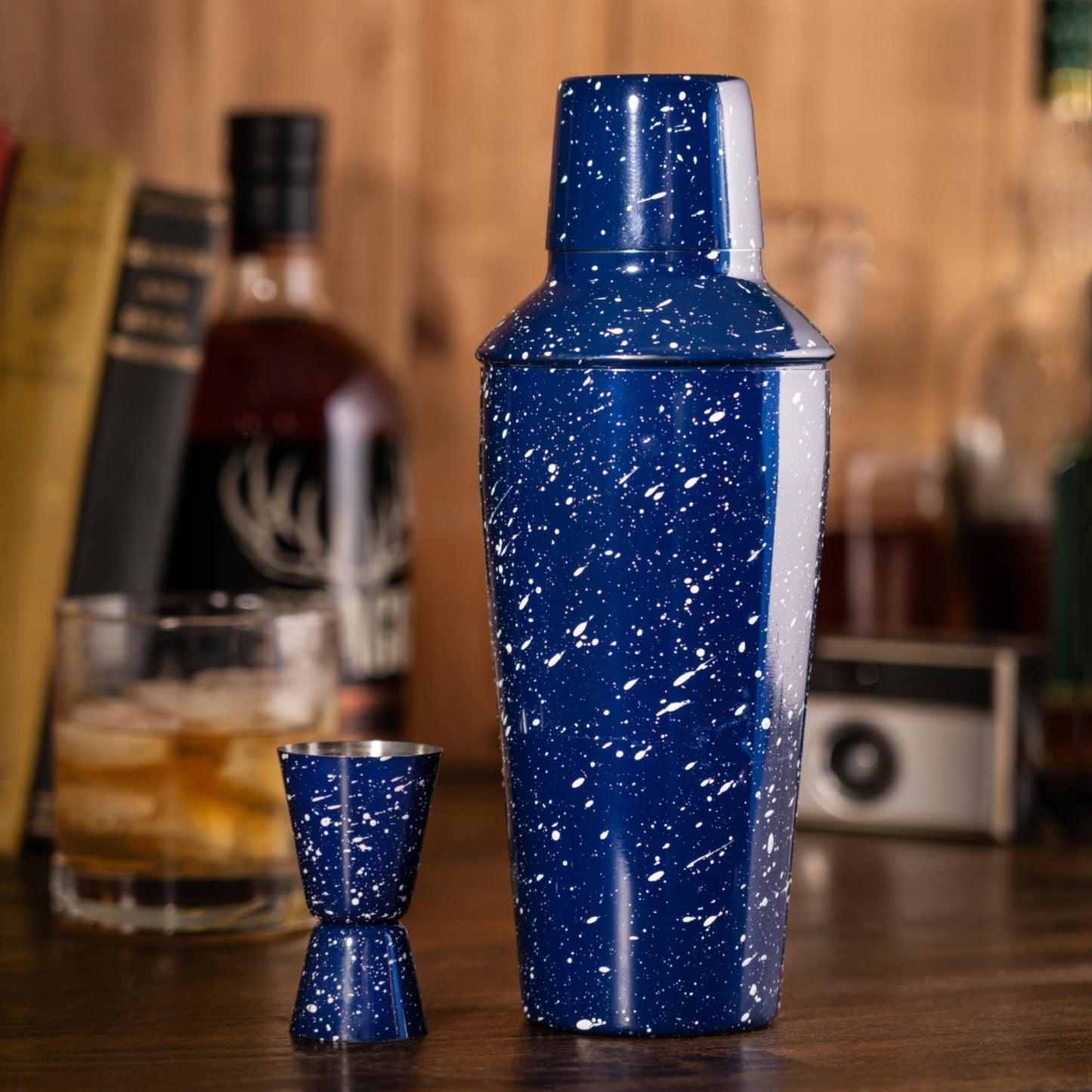 Durable stainless steel cocktail shaker designed for camping, featuring a sleek, portable design perfect for mixing drinks outdoors