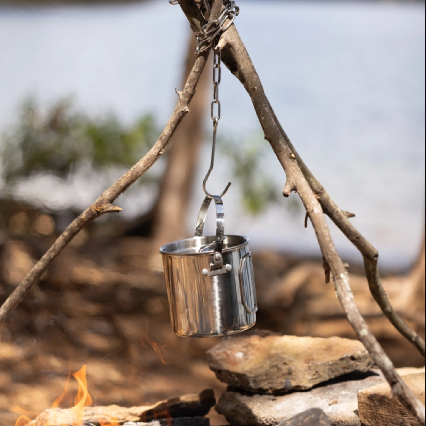 Small Campfire Tripod Set, perfect for outdoor cooking and camping, offering compact design and durable construction for a convenient campfire setup
