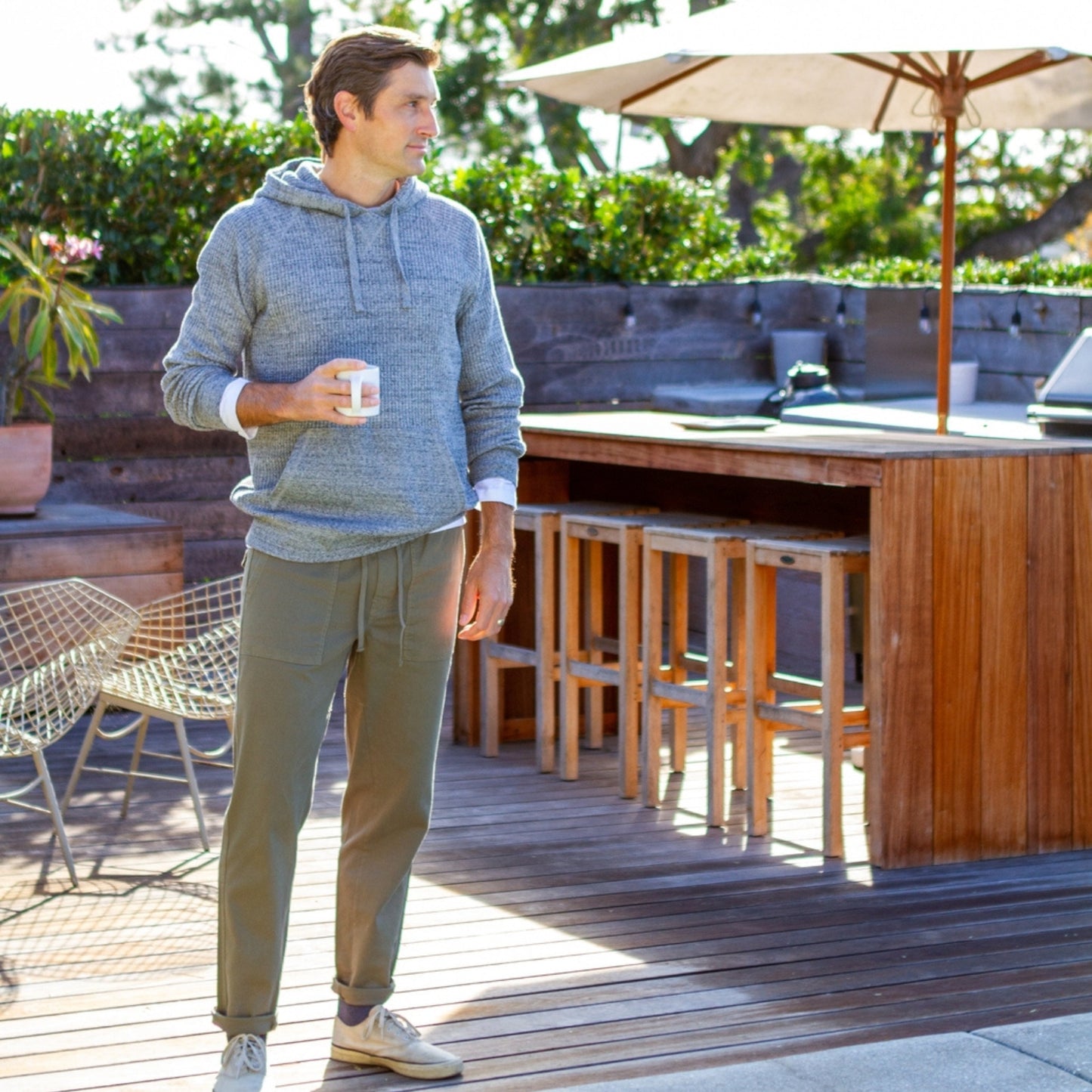 Men's green cargo pants with multiple pockets and a relaxed fit.