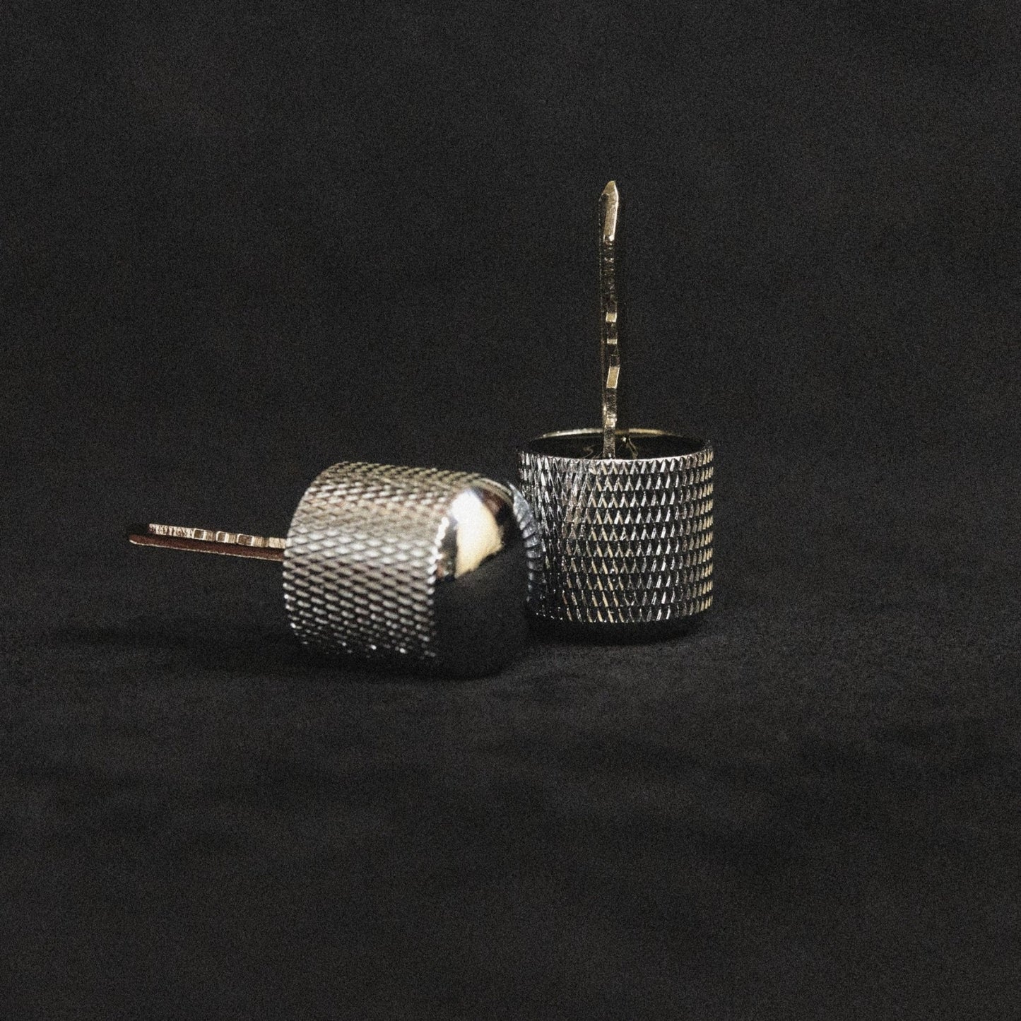 Alternative chrome low profile key for motorcycles, designed for a sleek and durable ignition solution.