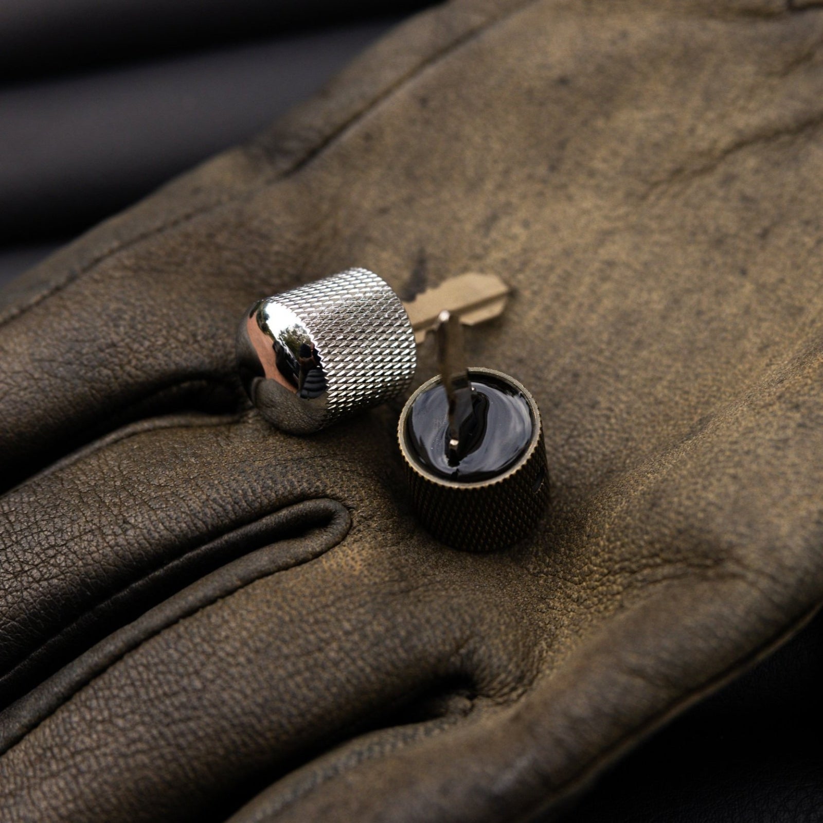 Alternative chrome low profile key for motorcycles, designed for a sleek and durable ignition solution.