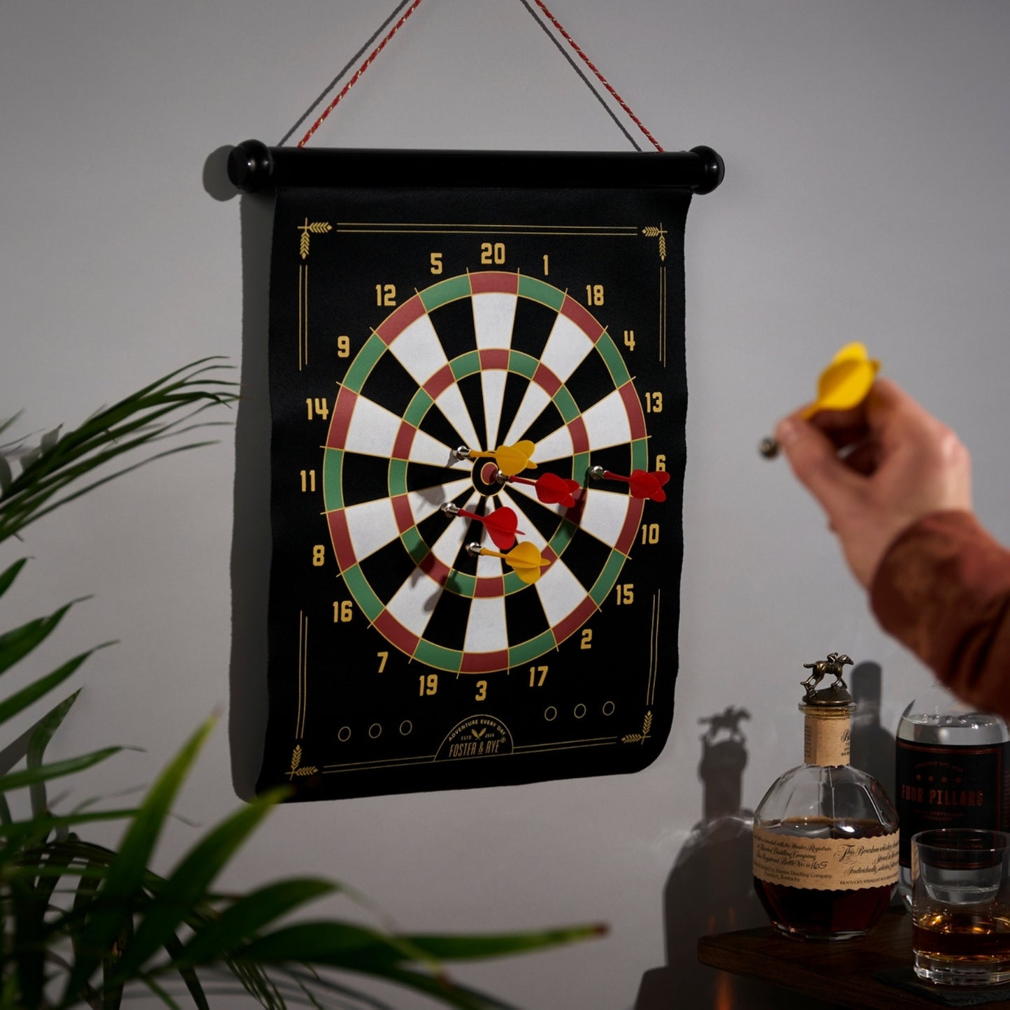 Magnetic dart board with vibrant design, safe for all ages, ideal for indoor games and recreational play, featuring strong magnetic darts.