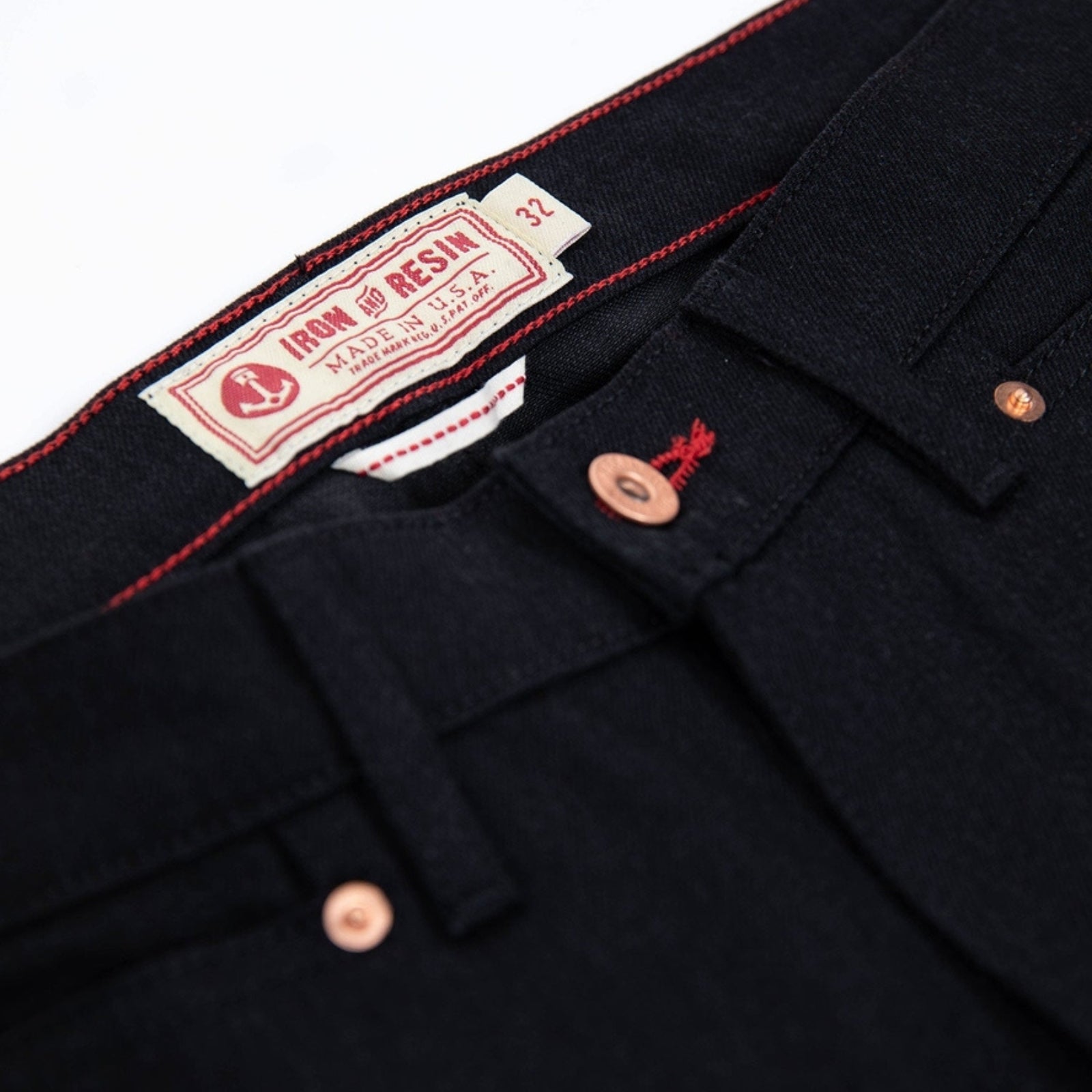 Pair of black enduro denim jeans with reinforced stitching and durable fabric, designed for off-road and outdoor activities.