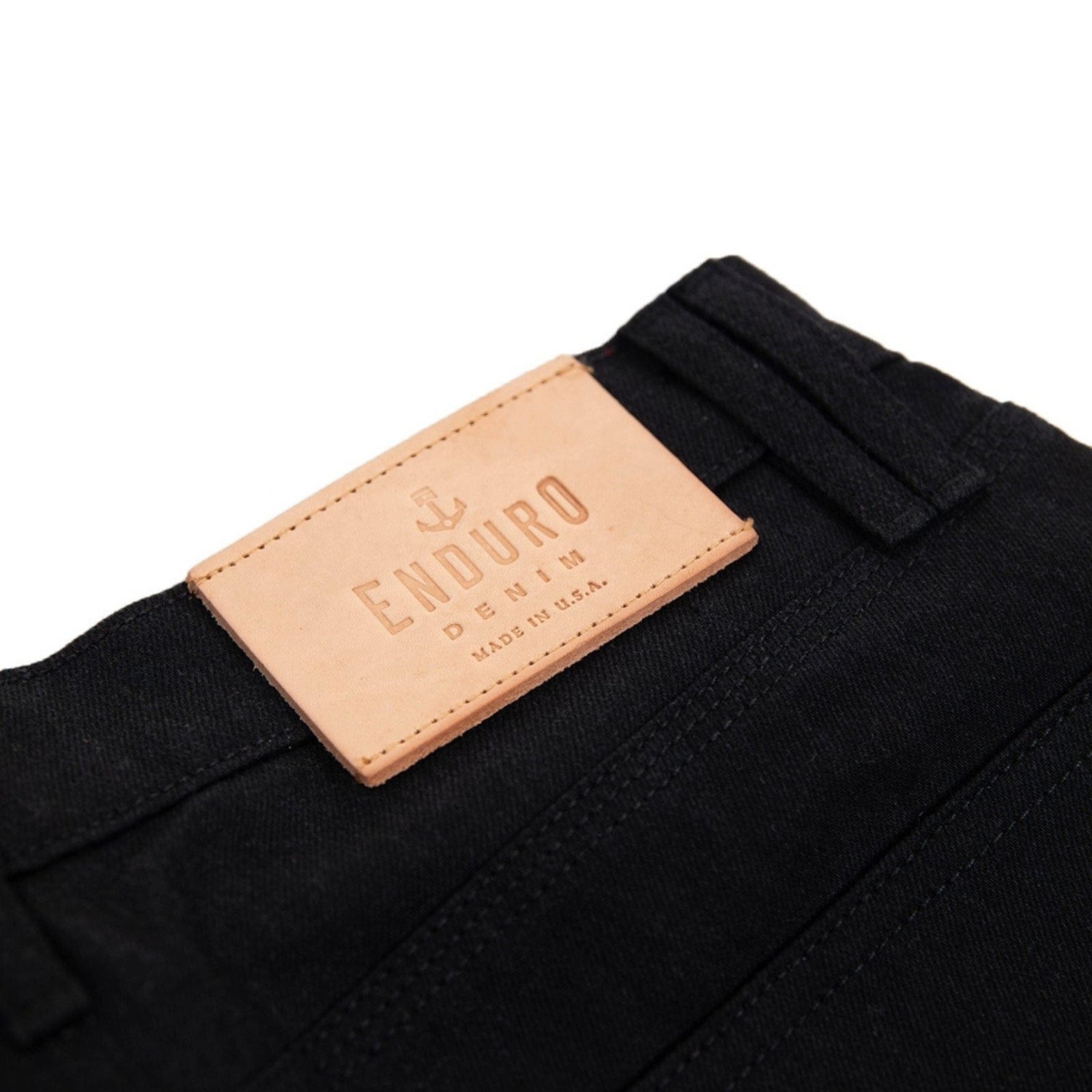 Pair of black enduro denim jeans with reinforced stitching and durable fabric, designed for off-road and outdoor activities.