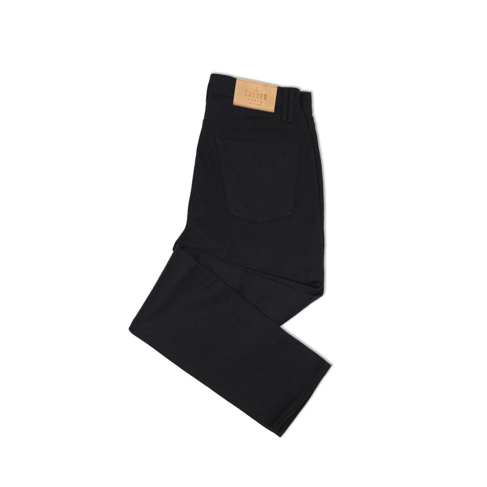 Pair of black enduro denim jeans with reinforced stitching and durable fabric, designed for off-road and outdoor activities.