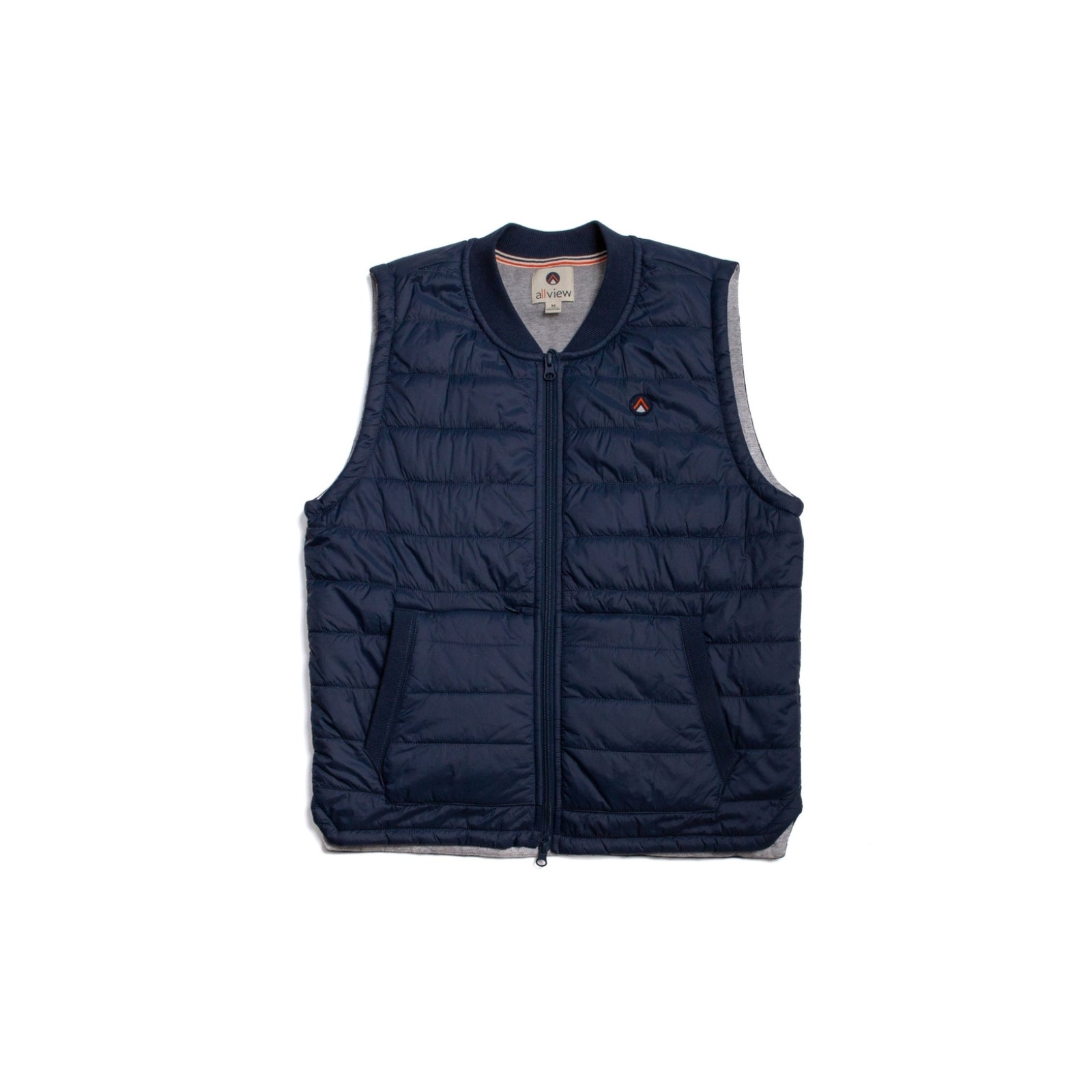 Close-up of a navy blue down vest that showcases the texture and insulation.