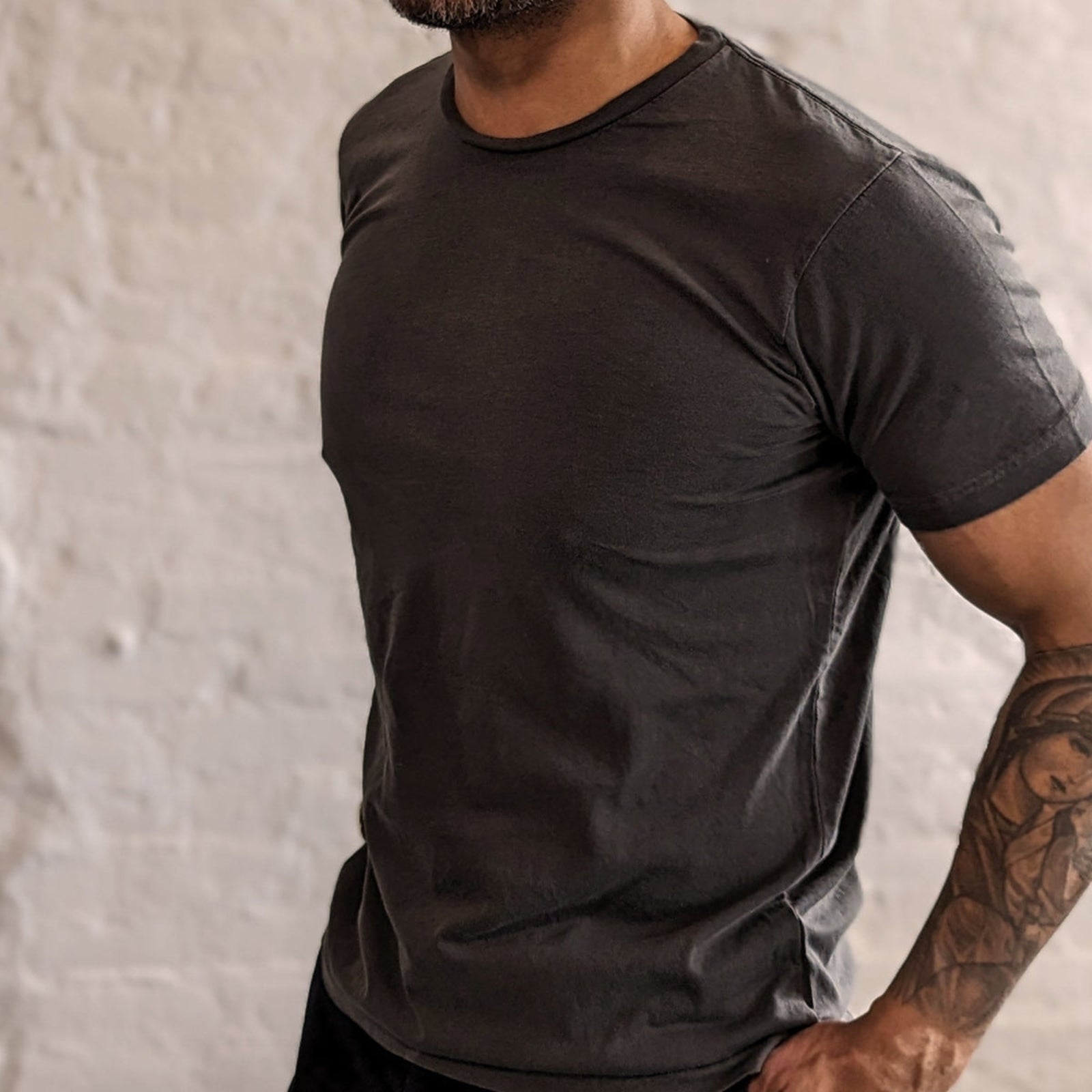Grey colored ultra-soft jersey tee made in the USA, featuring a comfortable fit and high-quality fabric, perfect for everyday wear with a casual, relaxed style.