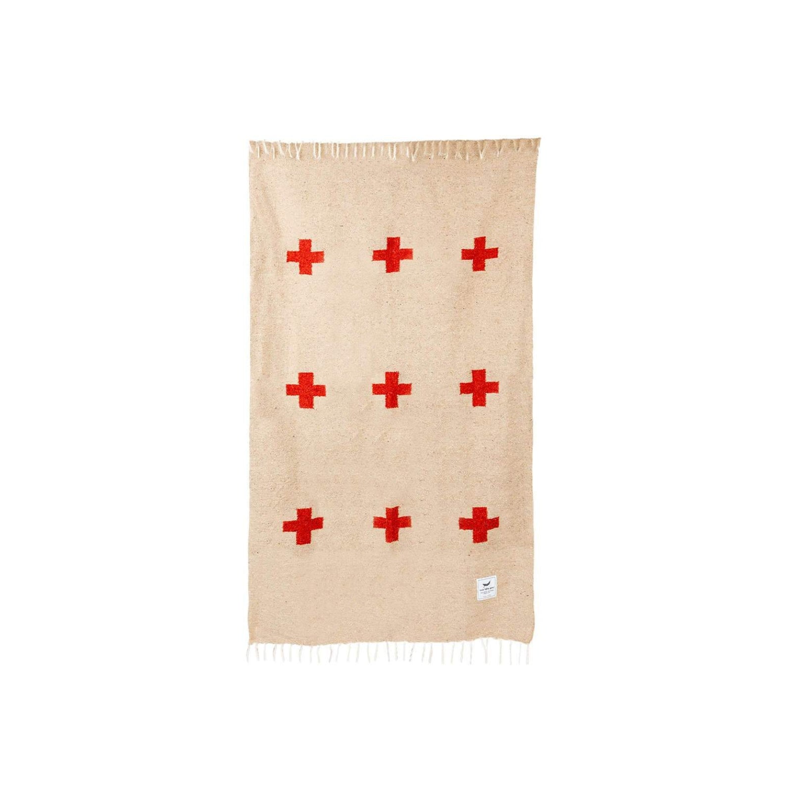 Handwoven throw blanket with intricate patterns, showcasing its cozy texture and warm colors.