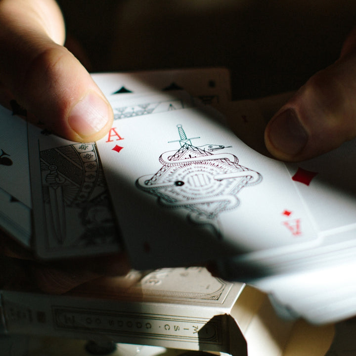 Close-up of a high-quality, unique playing card with intricate design, vibrant colors, and premium finish, showcasing luxury card craftsmanship.