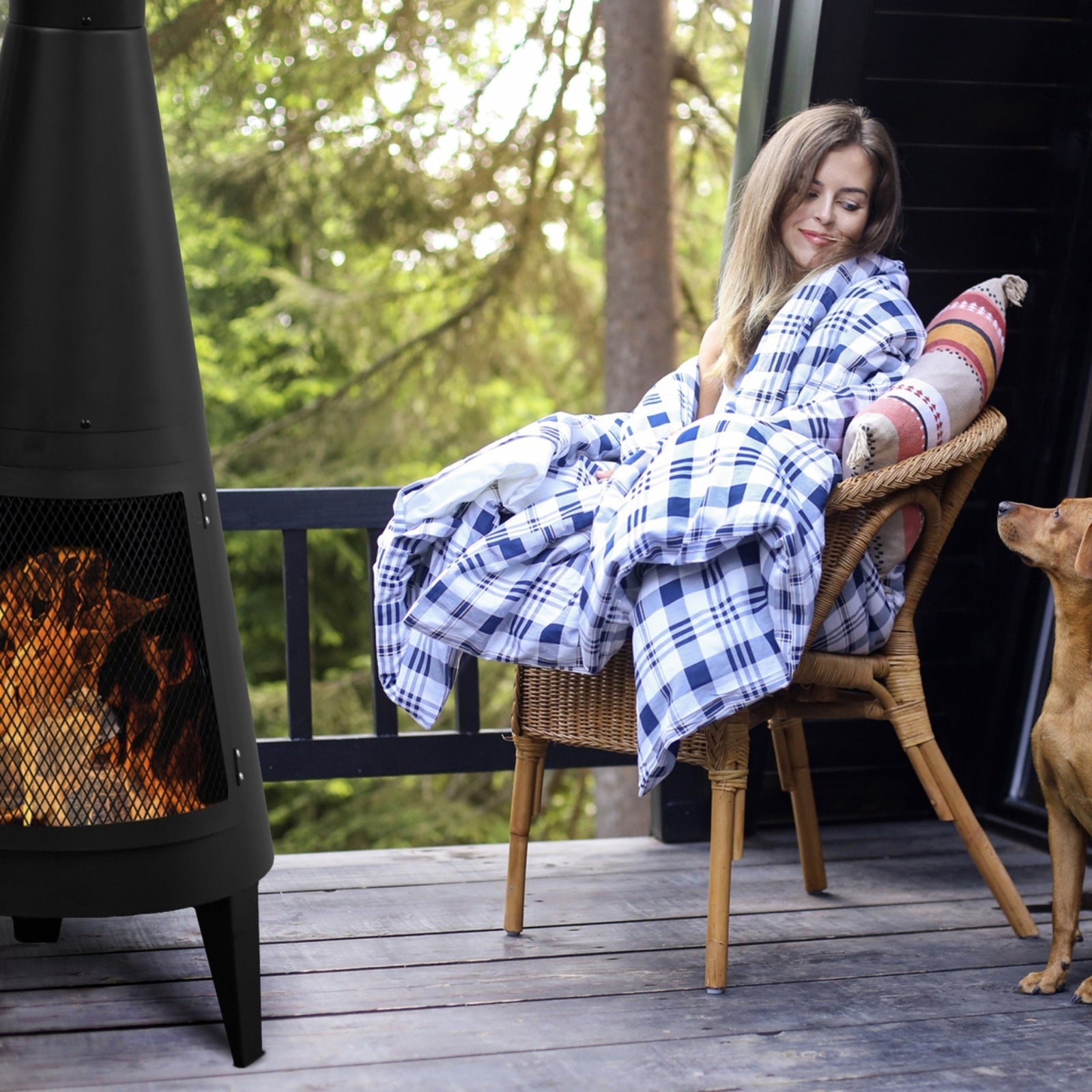Durable outdoor chimney-style fireplace made from iron, designed for warmth and ambiance in outdoor spaces, featuring rustic metal craftsmanship