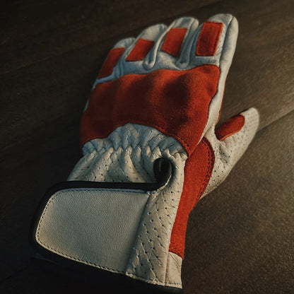 Vintage leather motorcycle gloves with classic design, perfect for riders who appreciate retro style and durability.