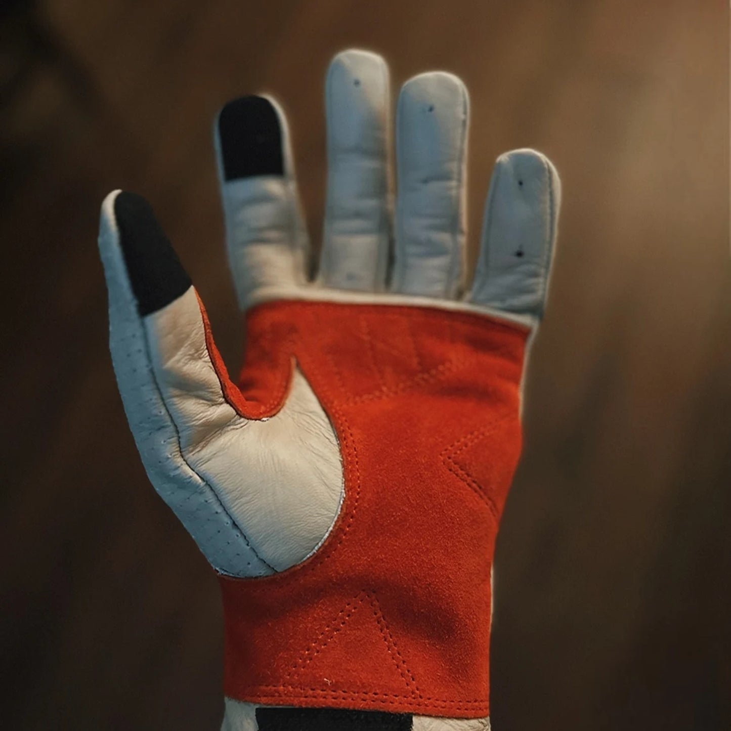 Vintage leather motorcycle gloves with classic design, perfect for riders who appreciate retro style and durability.