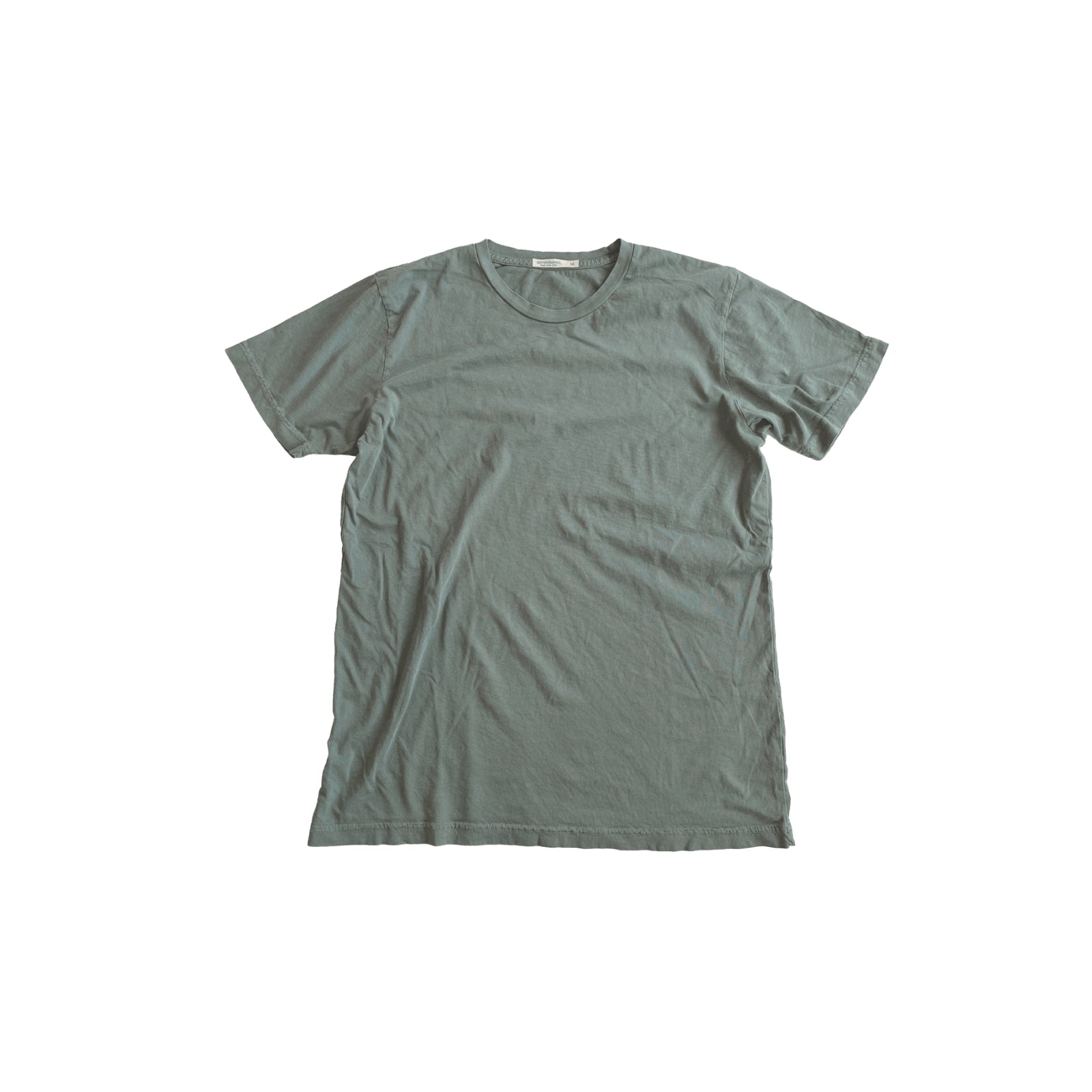 Sage colored ultra-soft jersey tee made in the USA, featuring a comfortable fit and high-quality fabric, perfect for everyday wear with a casual, relaxed style.