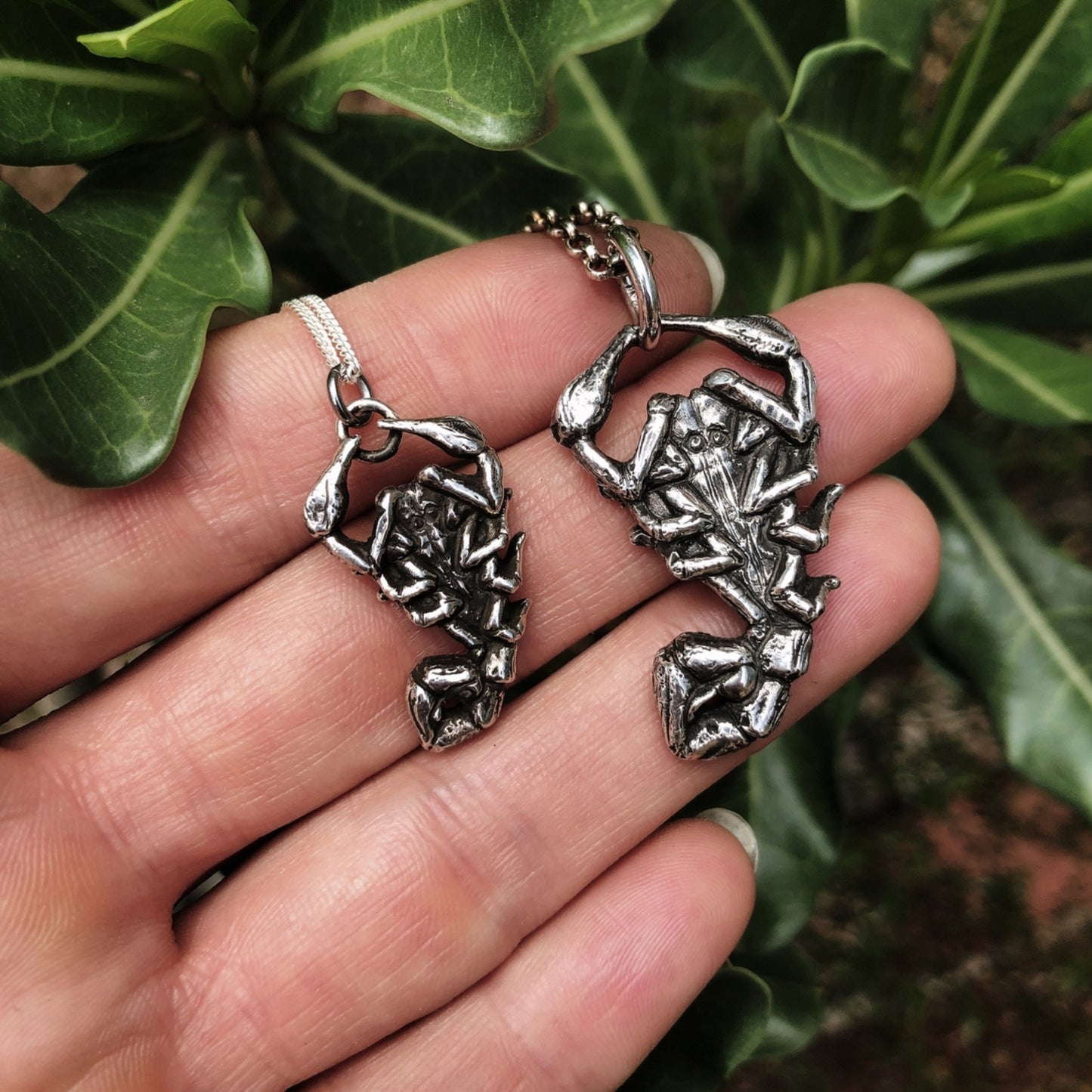 Intricate scorpion ring with detailed design, featuring a sleek matte look with a rounded smooth finish.