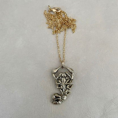 Intricate scorpion ring with detailed design, featuring a sleek matte look with a rounded smooth finish.