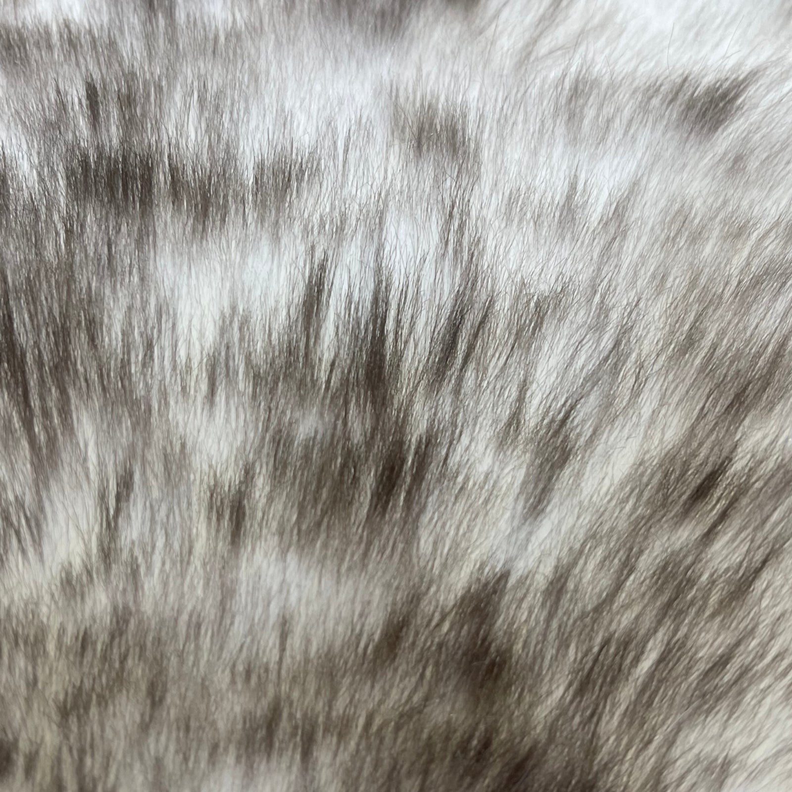 Soft and 100% natural sheepskin rug with natural, fluffy texture, showcasing premium quality craftsmanship and comfort for home decor.