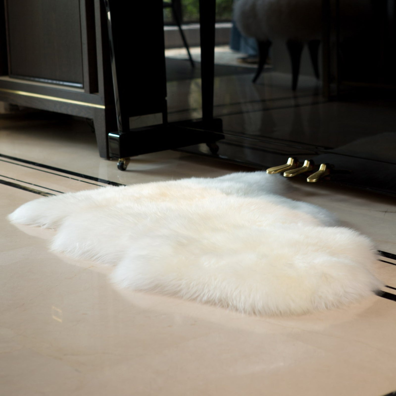Soft and 100% natural sheepskin rug with natural, fluffy texture, showcasing premium quality craftsmanship and comfort for home decor.