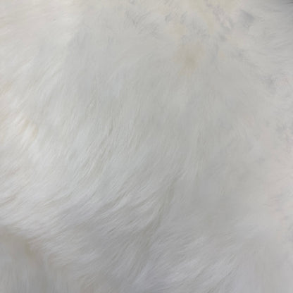 Soft and 100% natural sheepskin rug with natural, fluffy texture, showcasing premium quality craftsmanship and comfort for home decor.
