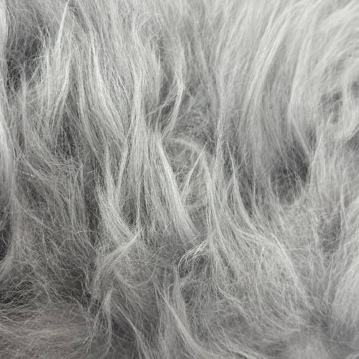 Soft and 100% natural sheepskin rug with natural, fluffy texture, showcasing premium quality craftsmanship and comfort for home decor.