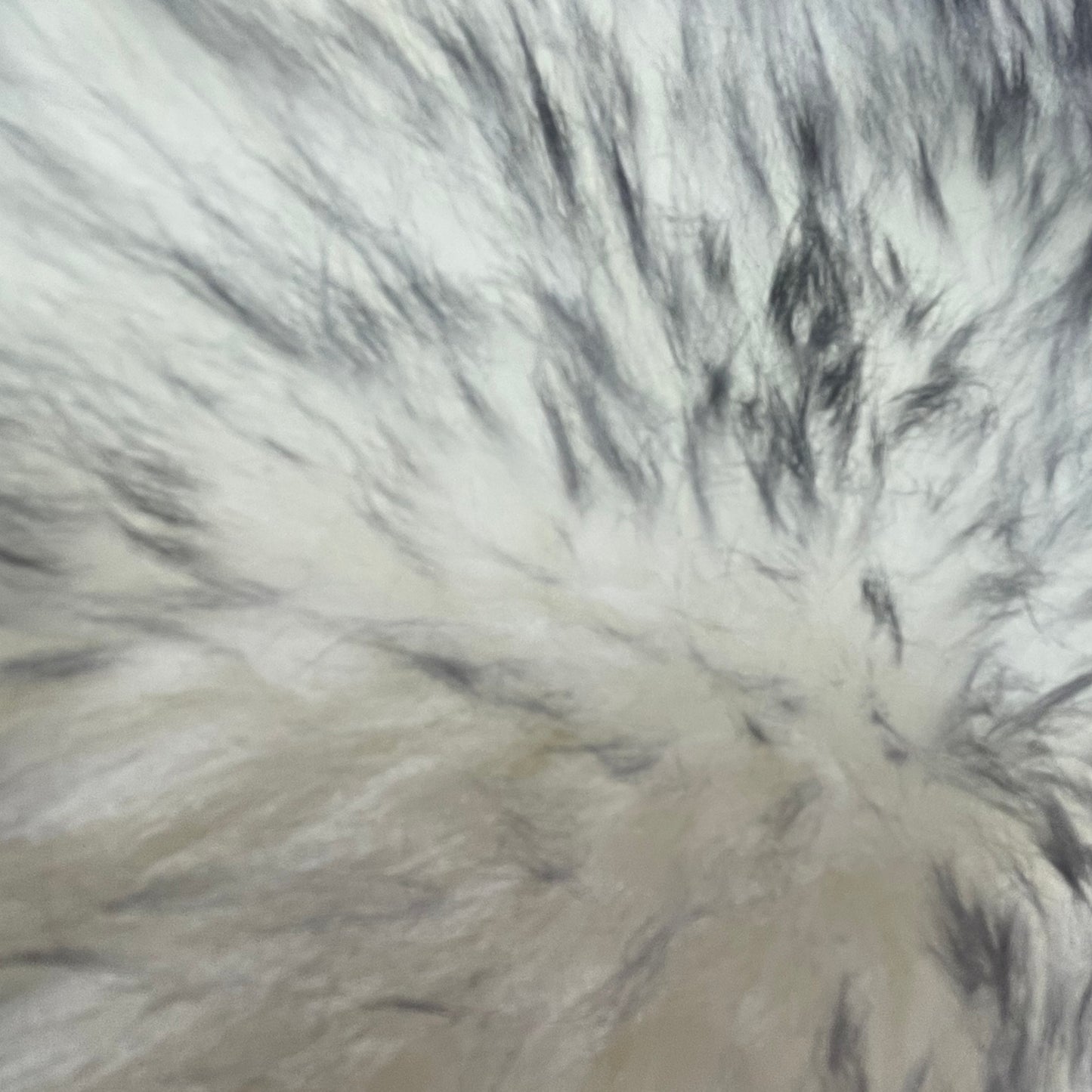 Soft and 100% natural sheepskin rug with natural, fluffy texture, showcasing premium quality craftsmanship and comfort for home decor.