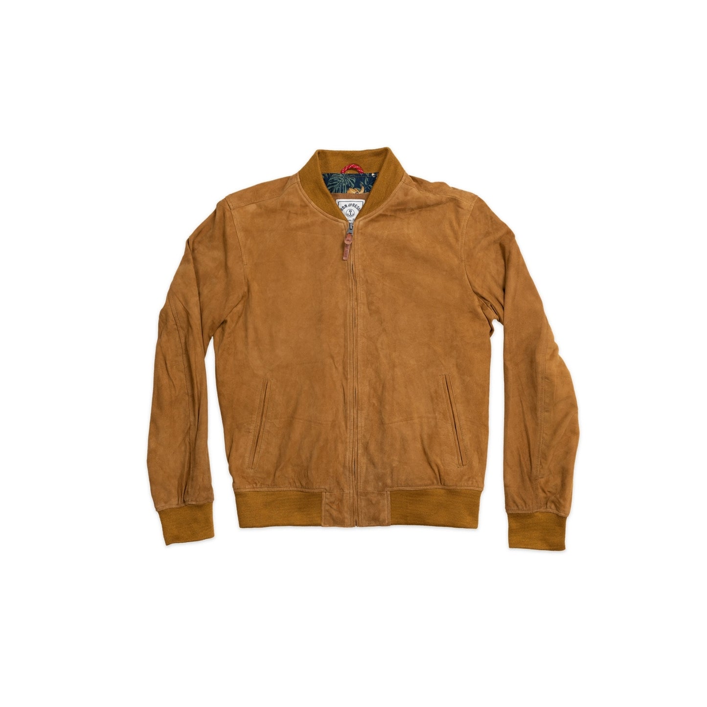 Luxuriously soft cognac goat suede bomber jacket with custom cotton poplin liner, two exterior side welt pockets for warmth, and vintage-inspired details for a classic look.