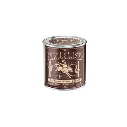 Tobacco & worn leather scented soy candle in a sleek container, showcasing its warm, inviting glow.