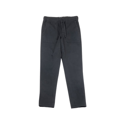 Men's vintage grey cargo pants with multiple pockets and a relaxed fit.