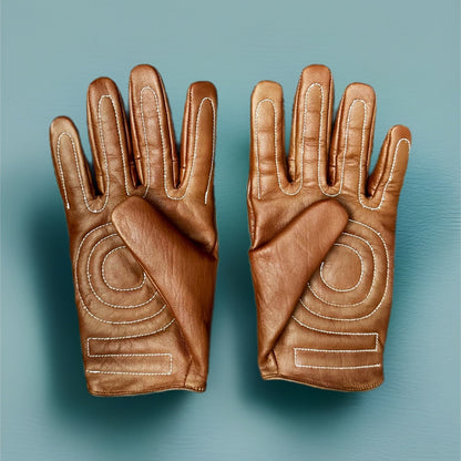Vintage motorcycle gloves made from premium lambskin leather, designed for comfort and durability.